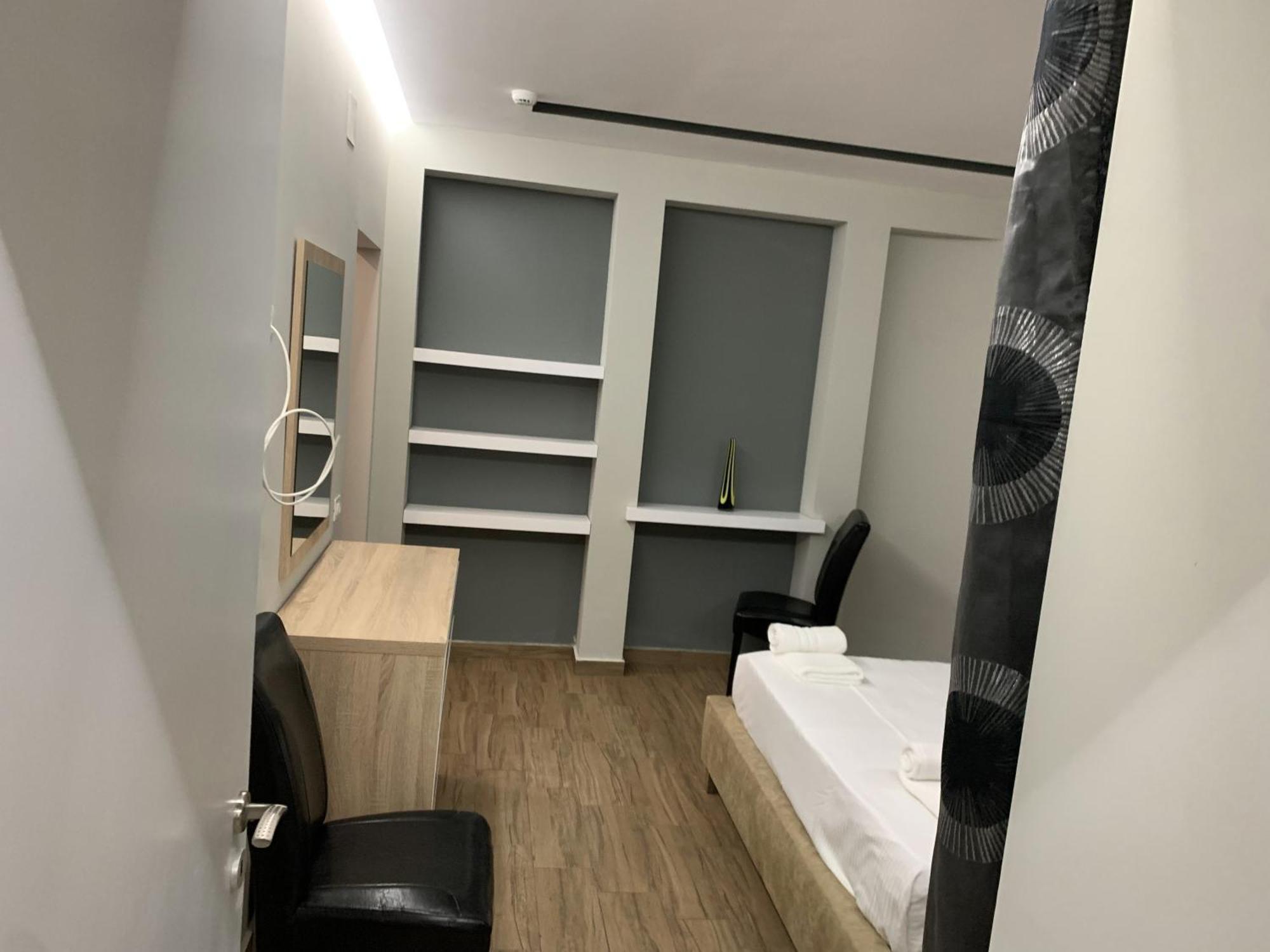 Luander Hotel Tirana Habitación foto