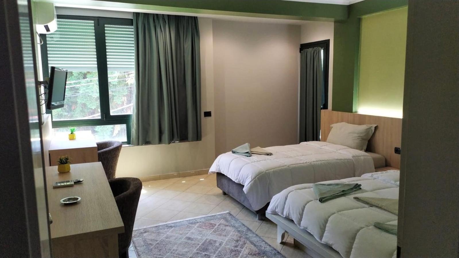 Luander Hotel Tirana Habitación foto
